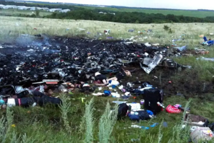 
	Destrui&ccedil;&atilde;o ap&oacute;s a queda do Boeing 777 mal&aacute;sio em Donetsk, leste da Ucr&acirc;nia
 (AFP/Getty Images)