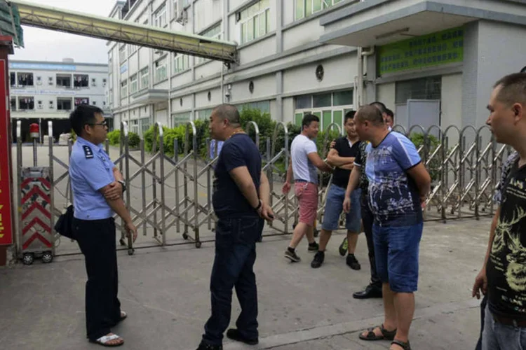 Dongguan Shinyang Electronics: grupo China Labor Watch disse ter encontrado 5 crianças trabalhando sem contratos na fornecedora (James Pomfret)