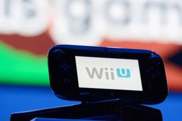 
	Wii U: empresa com sede em Kyoto projeta que vender&aacute; 3,6 milh&otilde;es de consoles Wii U neste ano
 (Kevork Djansezian/Getty Images)