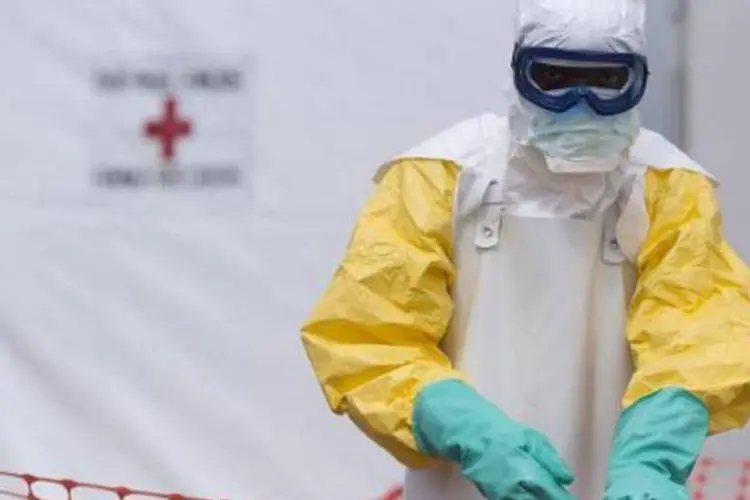 
	Ebola na &Aacute;frica: a epidemia matou 11.300 pessoas desde dezembro de 2013
 (Kenzo Tribouillard/AFP)