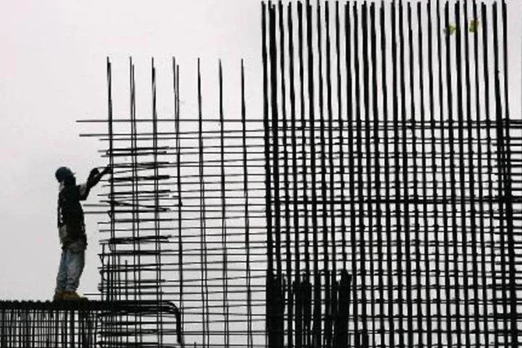 
	Na China, o dia foi de ganhos, liderados por empresas do setor imobili&aacute;rio em meio &agrave; expectativa de que Pequim diminua restri&ccedil;&otilde;es de financiamento
 (Robert Sullivan/AFP)
