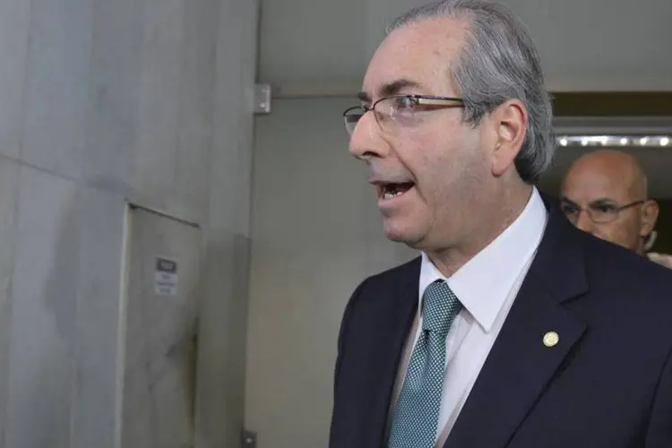
	O presidente da C&acirc;mara Eduardo Cunha (PMDB-RJ) ap&oacute;s an&uacute;ncio do rompimento com o governo
 (Antônio Cruz/Agência Brasil)