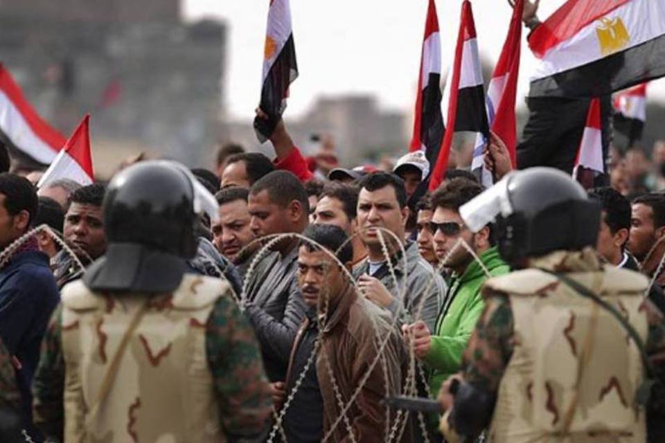 Protestos no Egito: locais sem presença da polícia são patrulhados por civis (Peter Macdiarmid/Getty Images)