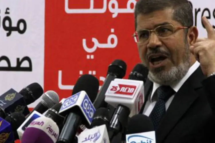 Mohamed Mursi: "Estamos ao lado do povo sírio, de sua luta e de sua revolução", declarou Mursi (©AFP / -)