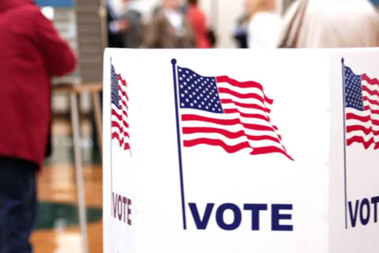 
	Pessoas votam nos Estados Unidos: a elei&ccedil;&atilde;o ocorre hoje (6), mas os eleitores, mesmo no exterior, j&aacute; enviaram seus votos por correio ou e-mail
 (foto/Getty Images)