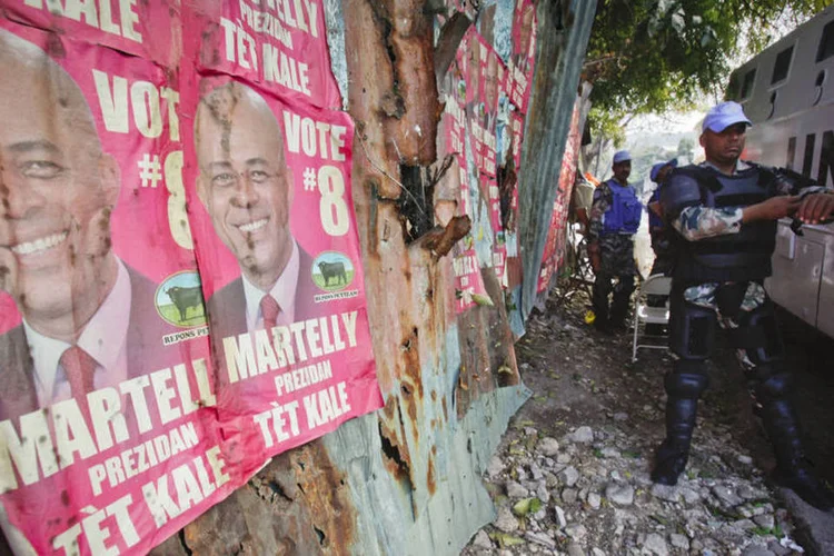 
	Haiti: no primeiro turno, o candidato apoiado pelo governo, Jovenel Mo&iuml;se, obteve 32,76% dos votos, contra 25,29% de Jude C&eacute;lestin
 (Lee Celano / Getty Images)