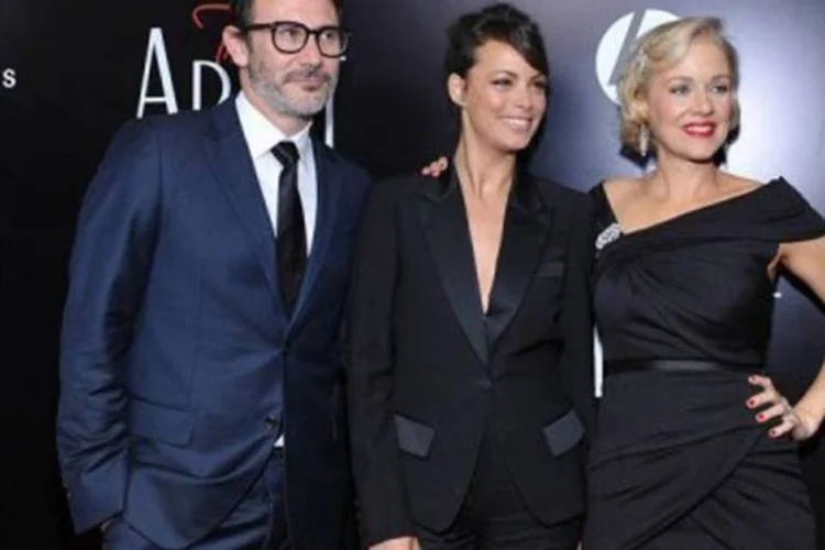 Parte do elenco do filme 'The Artist' em pré-estreia em Los Angeles (AFP/Getty Images/File/Marc Stamas)