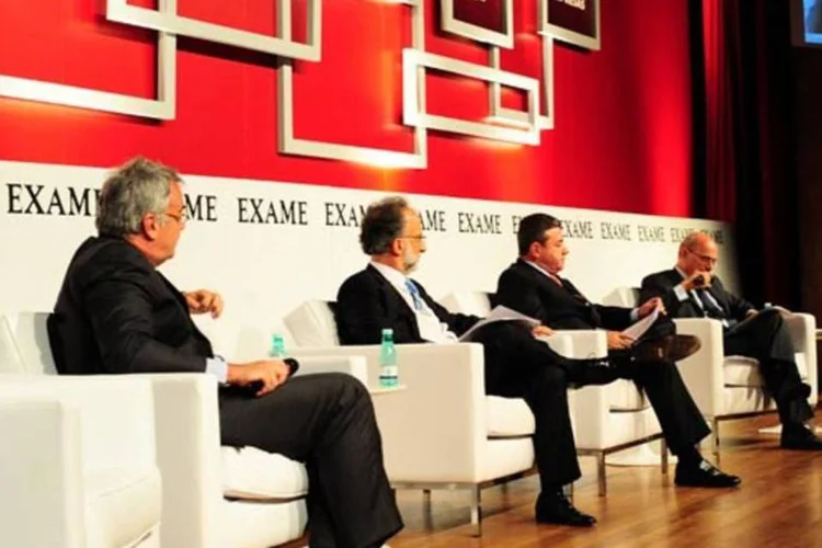 Da esquerda: Janot, Hallack, Primo, e o mediador, o jornalista Ricardo Boechat; empresário falaram sobre gargalos que barram o desenvolvimento da infraestrutura no Brasil (Alexandre Battibugli/EXAME)
