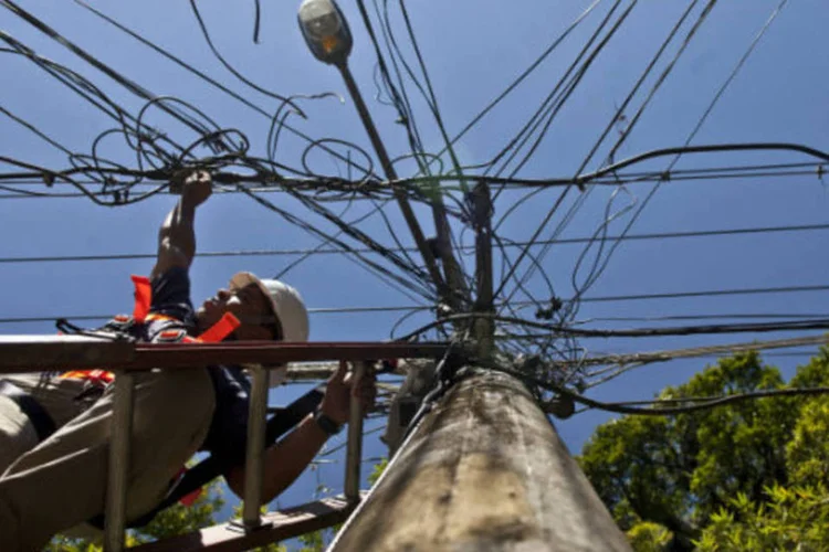 
	Cabos de rede de energia el&eacute;trica:&nbsp;compra do Grupo Rede torna a Energisa um dos principais grupos de distribui&ccedil;&atilde;o do Brasil
 (Dado Galdieri/Bloomberg)