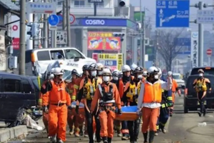 Equipe age contra vazamento nuclear em Fukushima, no Japão (©AFP  Toru Yamanaka)