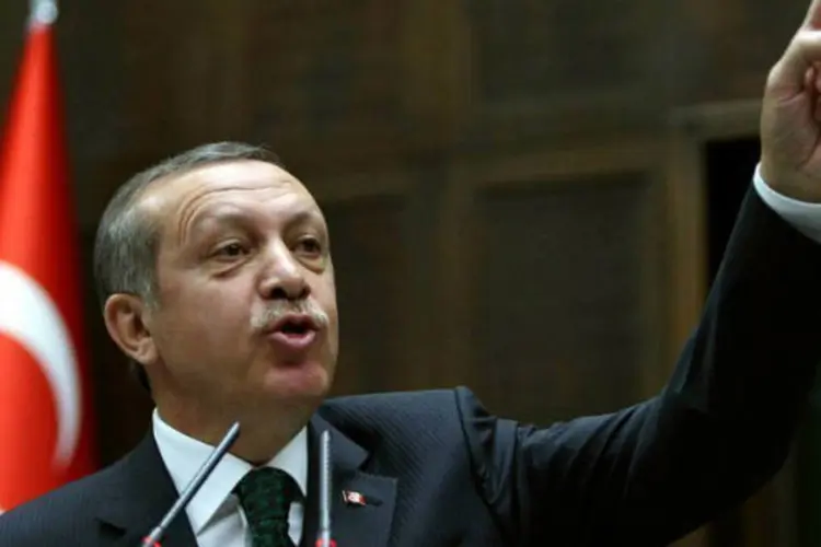 
	O primeiro-ministro da Turquia, Recep Tayyip Erdogan: o julgamento do jovem &eacute; um mais de uma s&eacute;rie de processos contra cidad&atilde;os que criticam Erdogan e o governo
 (AFP/ Adem Altan)