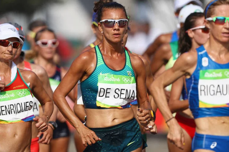 
	&Eacute;rica Sena: apesar de ter ficado fora do p&oacute;dio, &Eacute;rica, que fez o tempo de 1h29min29, conseguiu o melhor resultado de uma brasileira na marcha
 (Bryn Lennon/Getty Images)