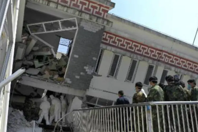Escola destruída no terremoto de 2008 em Sichuan, China: difícios das escolas desabaram com facilidade (Liu Jin/AFP)