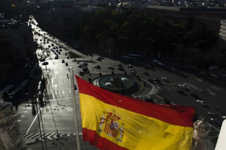 
	No m&ecirc;s passado, o presidente do Banco da Espanha, Luis Linde, disse que a economia espanhola pode retomar o crescimento no terceiro trimestre
 (Angel Navarrete/Bloomberg)