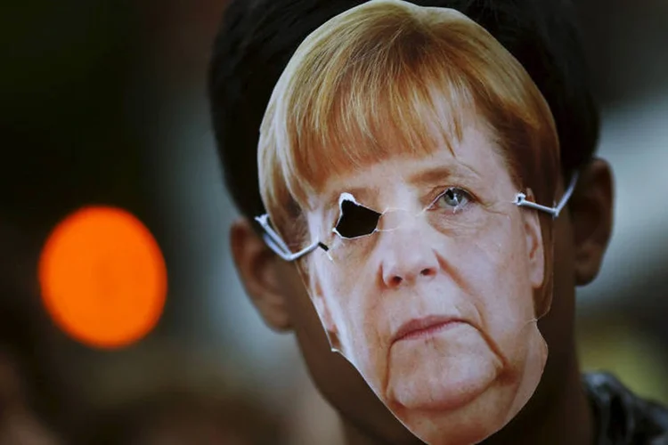 
	Angela Merkel: a chanceler rejeitou em v&aacute;rias ocasi&otilde;es essa proposta por considerar que o direito de asilo n&atilde;o pode ter limites num&eacute;ricos
 (REUTERS/Susana Vera)
