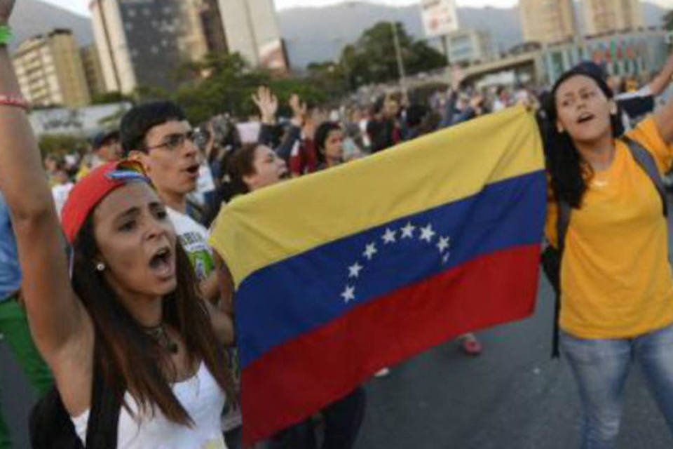 
	Estudantes protestam em Caracas contra o governo da Venezuela
 (Leo Ramirez/AFP)