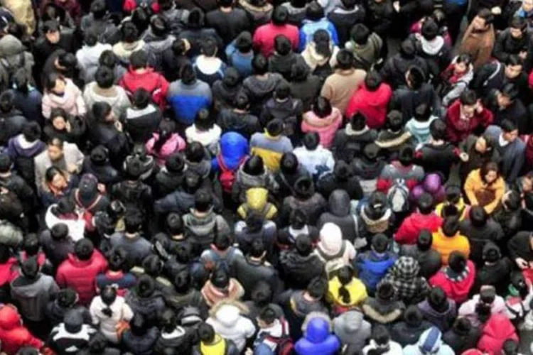 Estudantes chineses: política do "filho único" impediu 400 milhões de nascimentos (AFP)