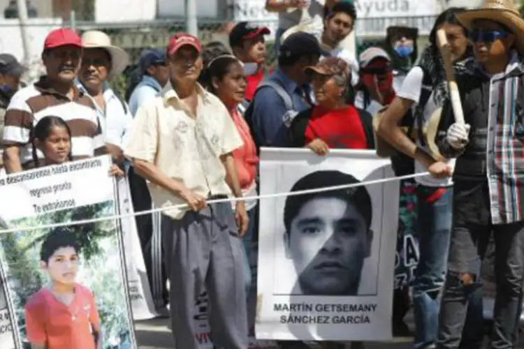 
	Parentes dos 43 estudantes mexicanos desaparecidos pedem justi&ccedil;a
 (Jesús Guerrero/AFP)