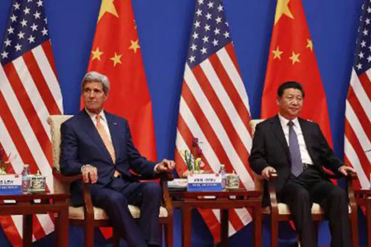 
	O secret&aacute;rio de Estado americano, John Kerry e o presidente chin&ecirc;s, Xi Jinping: dois dias de conversas acabaram hoje com mais de 100 acordos
 (©afp.com / JIM BOURG)
