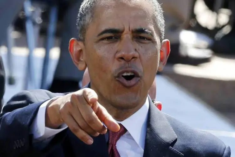 
	Barack Obama: Obama declarou estar disposto a bombardear o EI no Iraque e na S&iacute;ria
 (Pascal Rossignol/Reuters)