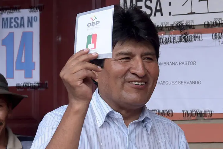 
	Evo Morales: o presidente, de 56 anos, no poder desde 2006, tinha previsto que o sim venceria com 70%
 (Danilo Balderrama / Reuters)