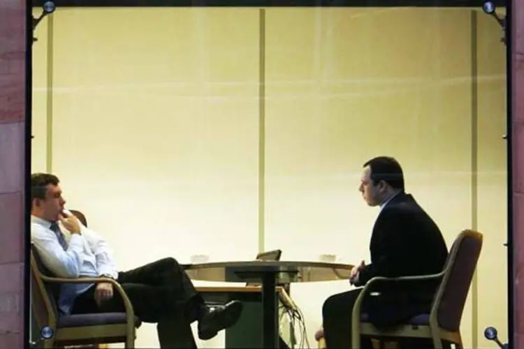 Executivos conversando (Getty Images)