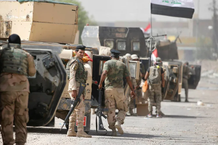 
	Primeiro-ministro do Iraque: &quot;Nossas for&ccedil;as de seguran&ccedil;a controlam a cidade, &agrave; exce&ccedil;&atilde;o de pequenos redutos, que ser&atilde;o limpos nas pr&oacute;ximas horas&quot;
 (Thaier Al-Sudani / Reuters)