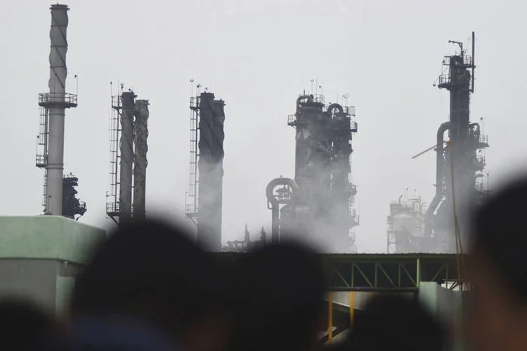 
	Explos&atilde;o em unidade petroqu&iacute;mica no M&eacute;xico: de acordo com o governo mexicano, o n&uacute;mero de pessoas desaparecidas caiu de 18 para oito
 (Angel Hernandez)