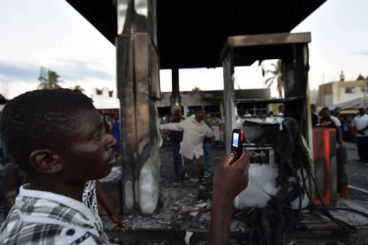 
	Haiti: sete pessoas morreram no inc&ecirc;ndio e trinta ficaram gravemente queimadas
 (Hector Retamal / AFP)