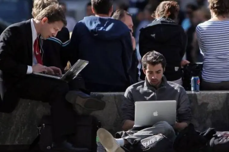 
	Pessoas usando computadores: teletrabalho acontece em qualquer lugar
 (Getty Images/Getty Images)