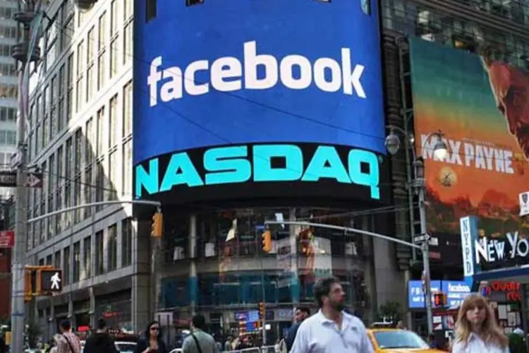 
	Fachada da Nasdaq na estreia das a&ccedil;&otilde;es do Facebook na bolsa: O Facebook se tornou a primeira companhia norte-americana a estrear no com um valor superior a 100 bilh&otilde;es
 (Getty Images)