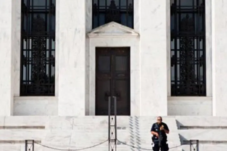 
	Pr&eacute;dio do Federal Reserve em Washington: os mercados aguardavam com muita expectativa qualquer sinal que o Fed pudesse dar sobre o futuro de seu programa de aquisi&ccedil;&otilde;es.
 (©AFP/Getty Images / Brendan Hoffman)