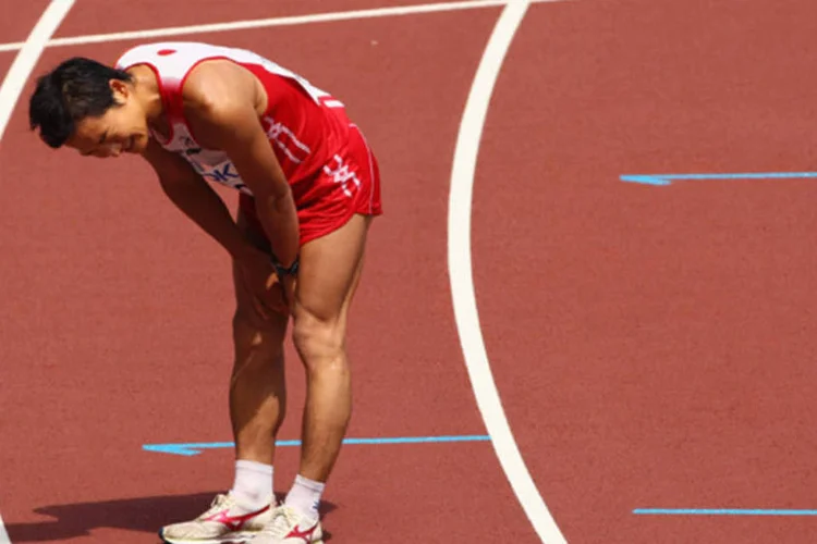 Atleta exausto após uma prova: pesquisa mostra que 3% da população americana sofre de Síndrome de Fadiga Crônica  (Getty Images/Mark Dadswell)