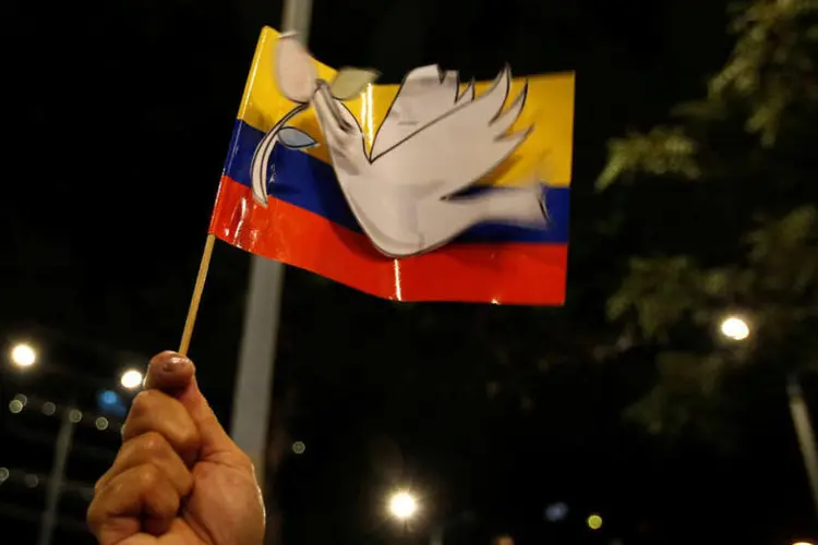 
	Acordo de paz: o presidente colombiano, Juan Manuel Santos, comemorou no Twitter a rea&ccedil;&atilde;o do TPI
 (John Vizcaino / Reuters)