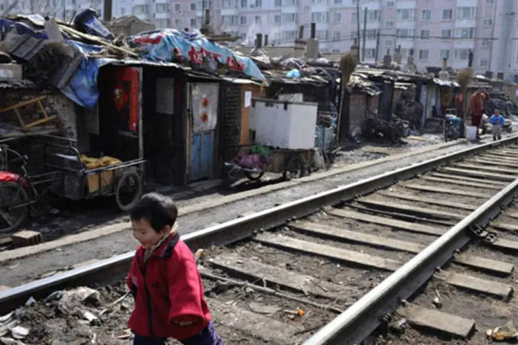 Favela em Shenyang, na China: a locomotiva chinesa é rápida, mas milhões estão fora do trem (China Photos/Getty Images)