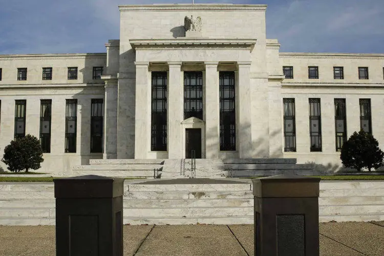 
	Pr&eacute;dio do Federal Reserve em Washington: o banco sinalizou cen&aacute;rio mais cauteloso para o crescimento econ&ocirc;mico dos EUA e reduziu sua proje&ccedil;&atilde;o para a taxa de juros
 (Gary Cameron/Files/Reuters)