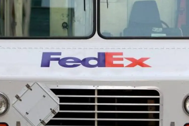 
	Caminh&atilde;o da FedEx: empresa tamb&eacute;m reduziu sua previs&atilde;o de lucro para o ano
 (.)