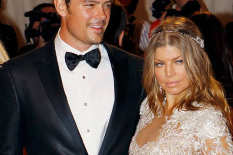 O ator Josh Duhamel e sua esposa, Fergie (REUTERS/Mike Segar)