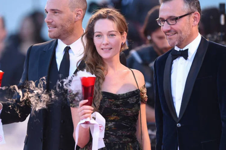 Atores durante a pré-estreia do filme "La Rancon De La Gloire", no 71º Festival de Cinema de Veneza (Gareth Cattermole/Getty Images)
