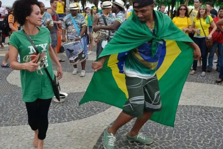 
	Fifa Fan Fest em Copacabana: hospitalidade dos cariocas foi aprovada por 97,1% dos turistas estrangeiros
 (Tomaz Silva/Agência Brasil)