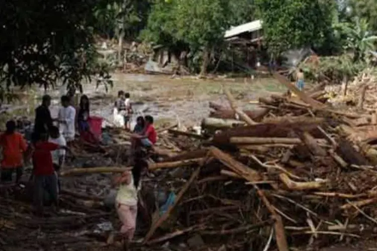 Enchentes nas Filipinas: tempestade tropical "Soala" provocou fortes chuvas que causaram 12 mortes (Cherryl Vergeire/ AFP)