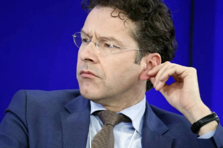 
	Jeroen Dijsselbloem sobre uma solu&ccedil;&atilde;o para Gr&eacute;cia: &quot;vai demorar, mas ainda h&aacute; motivos para ser otimista, apesar de ser muito dif&iacute;cil&quot;
 (Jason Alden/Bloomberg)