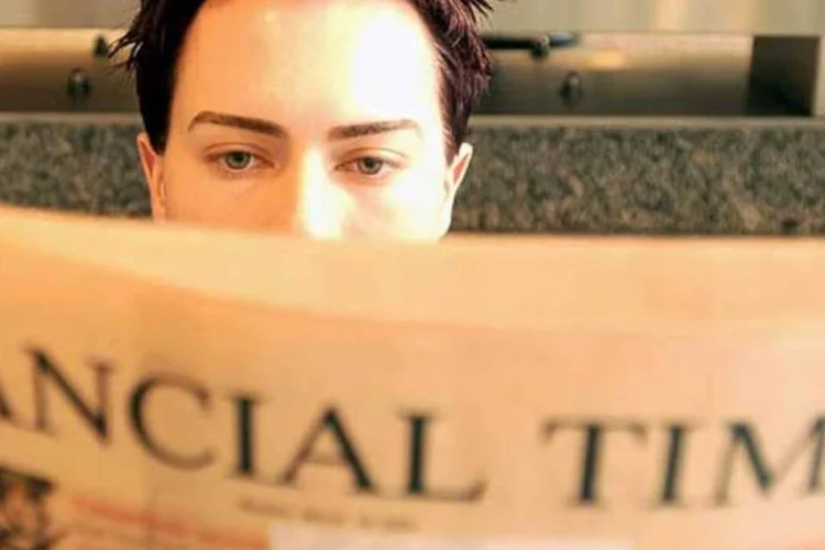 
	Homem l&ecirc; Financial Times: haveria negocia&ccedil;&otilde;es para a conclus&atilde;o dessa venda na pr&oacute;xima semana, segundo revista especializada
 (Getty Images)