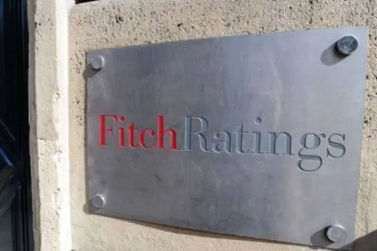 Entrada do prédio da Fitch Ratings, em Paris: a Fitch justificou a redução devido aos efeitos da crise e pela falta de confiança no setor bancário espanhol (Miguel Medina/AFP)