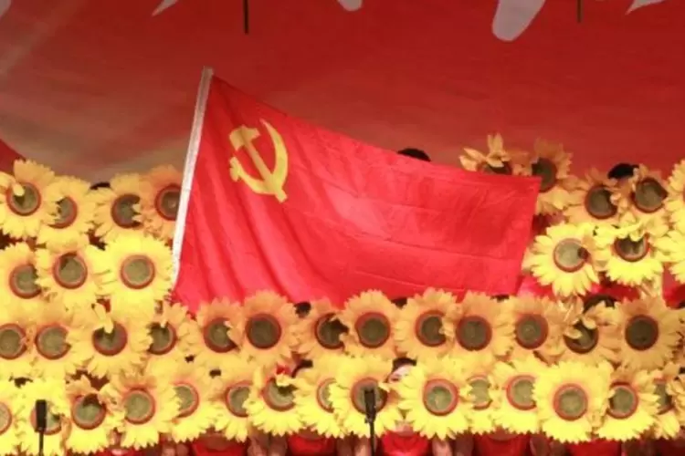 Flores na comemoração chinesa (ChinaFotoPress/Getty Images)