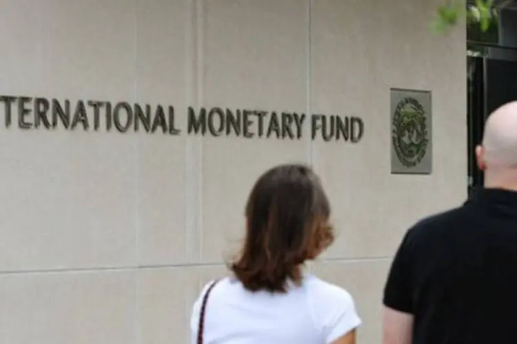 
	Fachada do FMI: o fundo recomendou&nbsp;&quot;evitar novas fus&otilde;es que n&atilde;o gerem benef&iacute;cios de maneira clara&quot;&nbsp;
 (Mandel Ngan/AFP)
