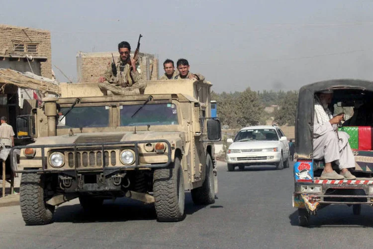
	For&ccedil;a de seguran&ccedil;a afeg&atilde; em Kunduz: o governo afeg&atilde;o negou que os talib&atilde;s tenham entrado em Kunduz e afirmou que as for&ccedil;as de seguran&ccedil;a lutam contra os insurgentes nos arredores da cidade
 (Reuters / Stringer)