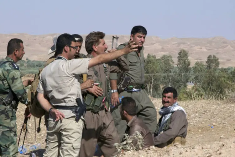 
	For&ccedil;as de seguran&ccedil;a do Curdist&atilde;o: presid&ecirc;ncia curda explicou que Dunford e a delega&ccedil;&atilde;o que o acompanhou na viagem mantiveram encontros &quot;longos e amplos&quot; com Barzani
 (Stringer/Reuters)