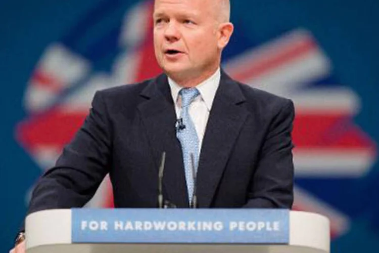 
	O secret&aacute;rio brit&acirc;nico de Rela&ccedil;&otilde;es Exteriores, William Hague:&nbsp;Hague advertiu que Moscou pode enfrentar&nbsp;custos significativos
 (Leon Neal/AFP)