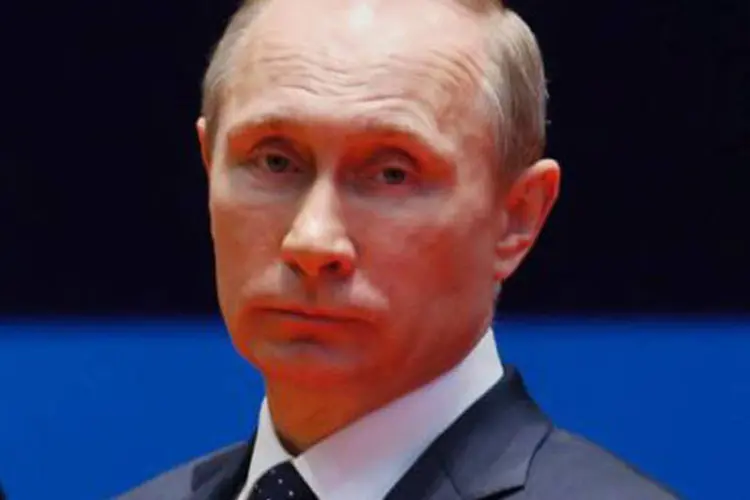 
	O presidente da R&uacute;ssia, Vladimir Putin: &quot;veremos se a Ucr&acirc;nia e o governo ucraniano v&atilde;o ceder a esta chantagem&quot;, disse
 (Beawiharta/AFP)